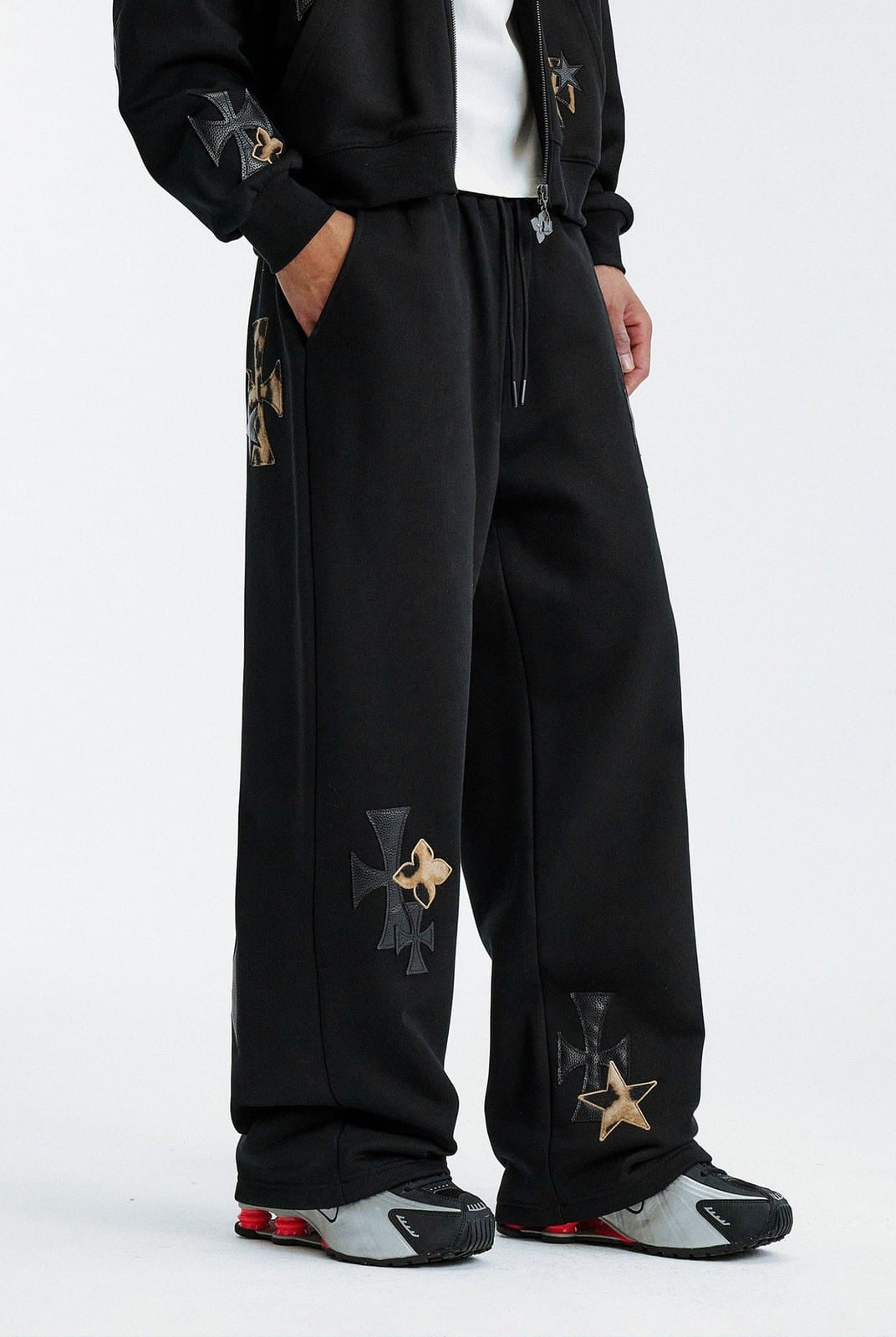 MEDM Leopard Leather Patch Drawstring Pants in Black - On Male Model