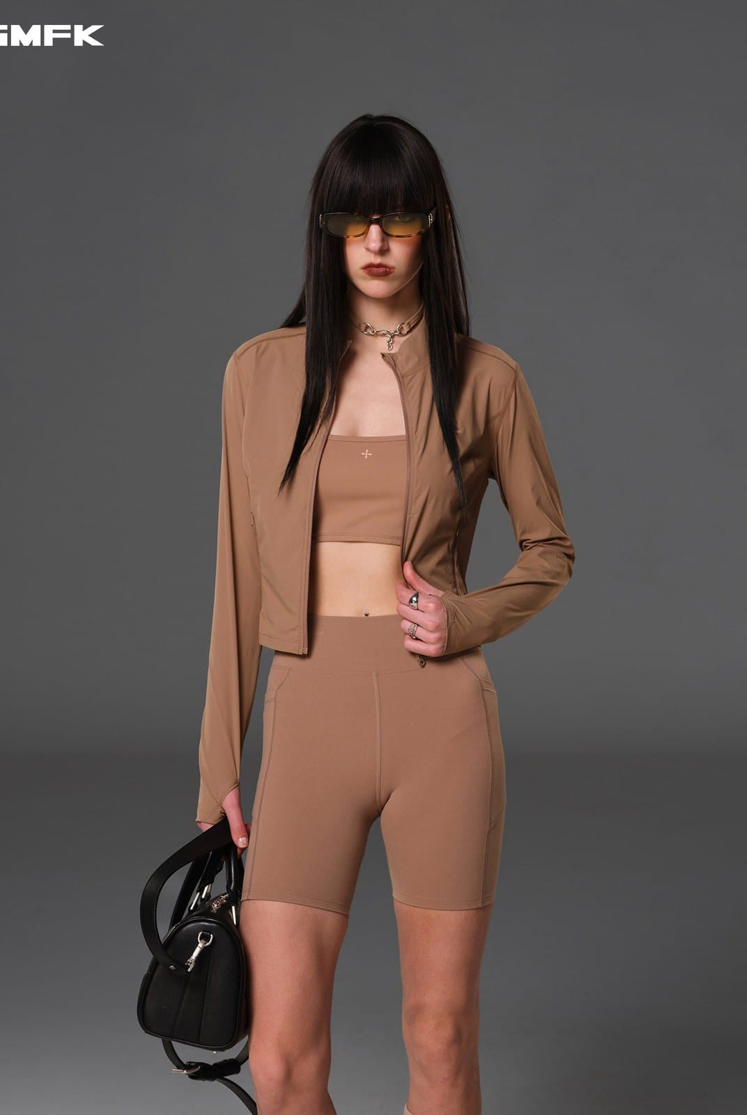 SMFK Cropped Stretch Nylon Track Jacket in Brown - On Female Model