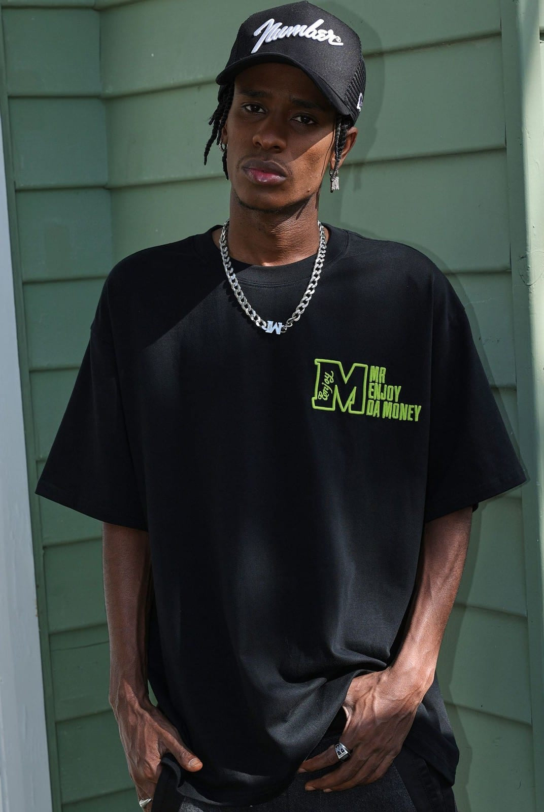 MEDM Half Sleeve Cotton Logo T Shirt in Black - On Male Model