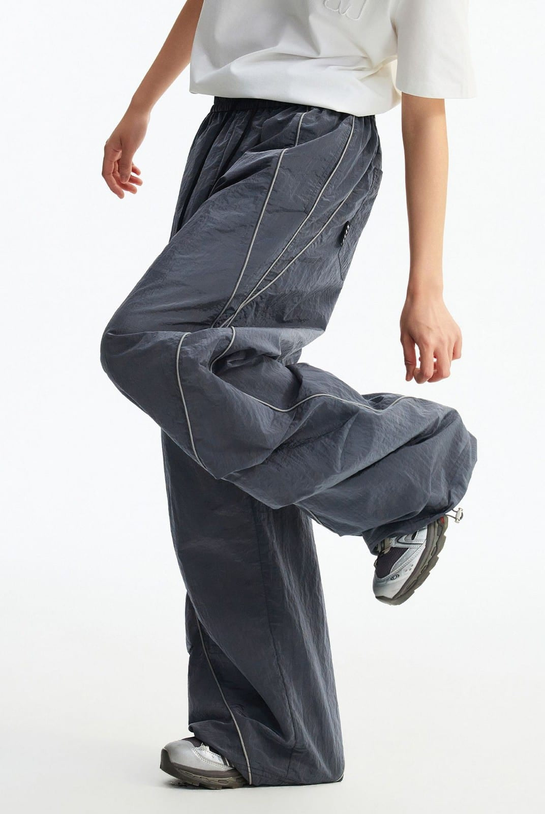 MEDM Glossy Piped Techwear Track Pants in Gray - On Model