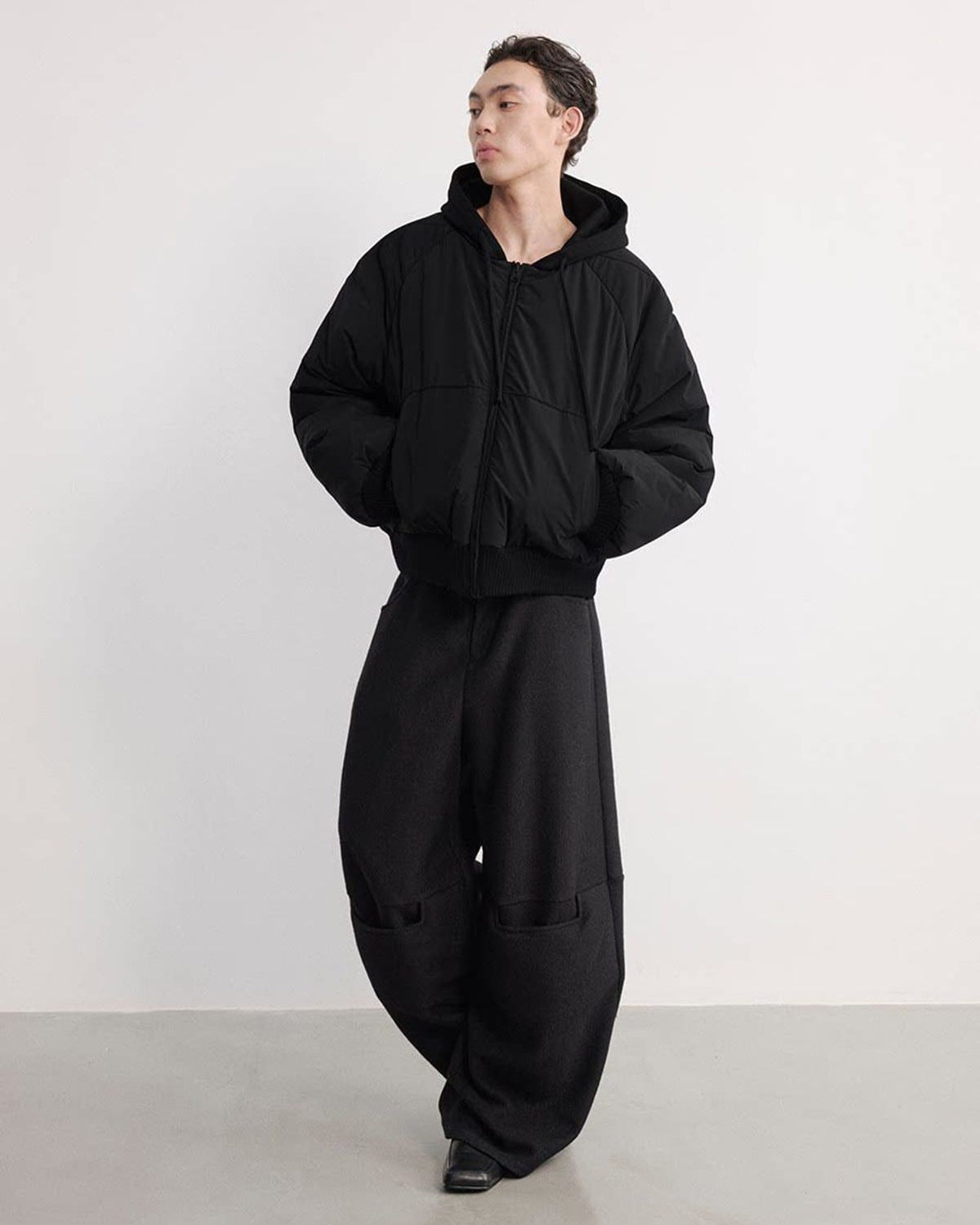 JCAESAR STUDIO Reversible Hooded Nylon Bomber in Black - On Male Model