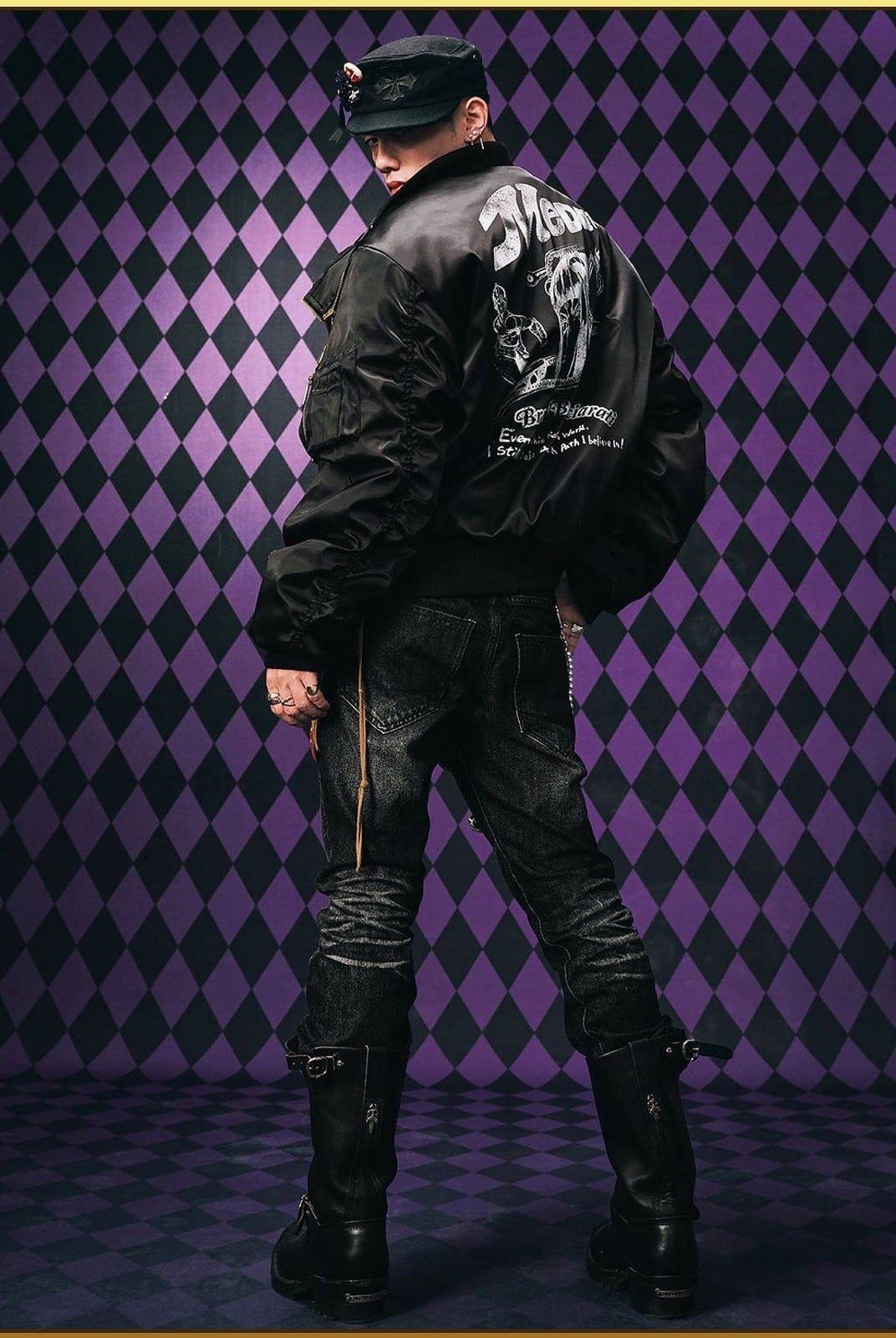 MEDM JoJo Collab Graphic Puffer Bomber in Black - On Male Model