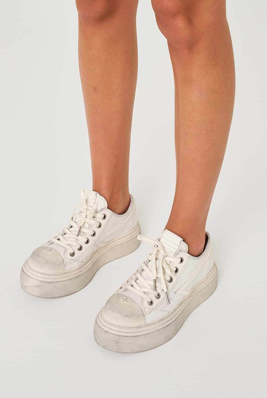 SMFK Distressed Canvas Skate Sneakers in White - On Female Model