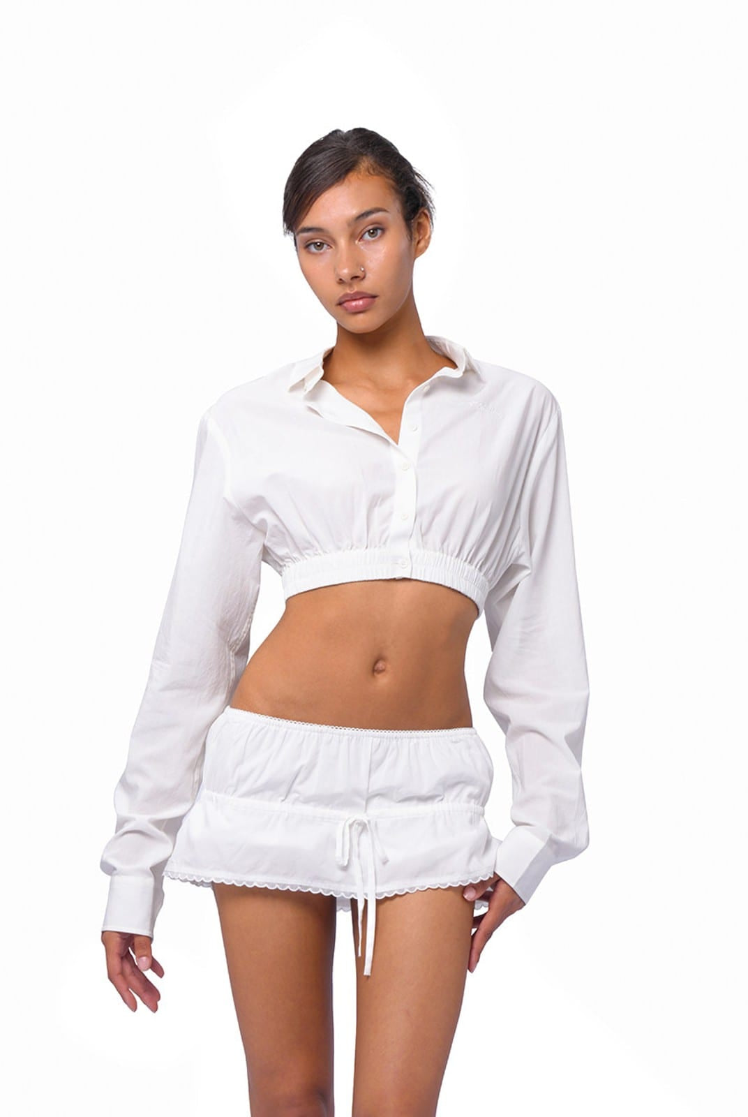SweetChilling Drawstring Ruffled Mini Skirt in White - On Female Model