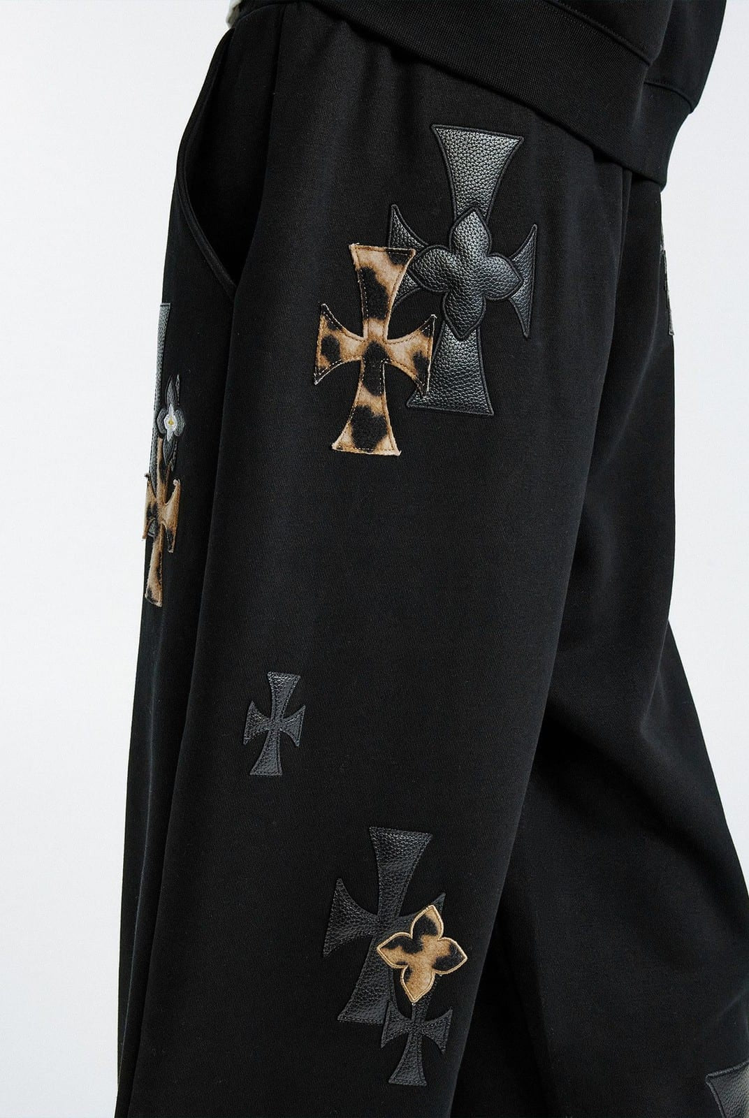 MEDM Leopard Leather Patch Drawstring Pants in Black - On Model
