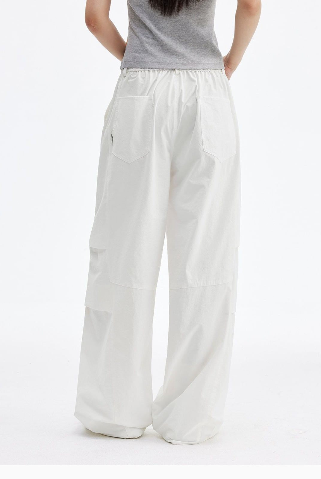 MEDM Crinkled Nylon Parachute Cargo Pants in White - On Model