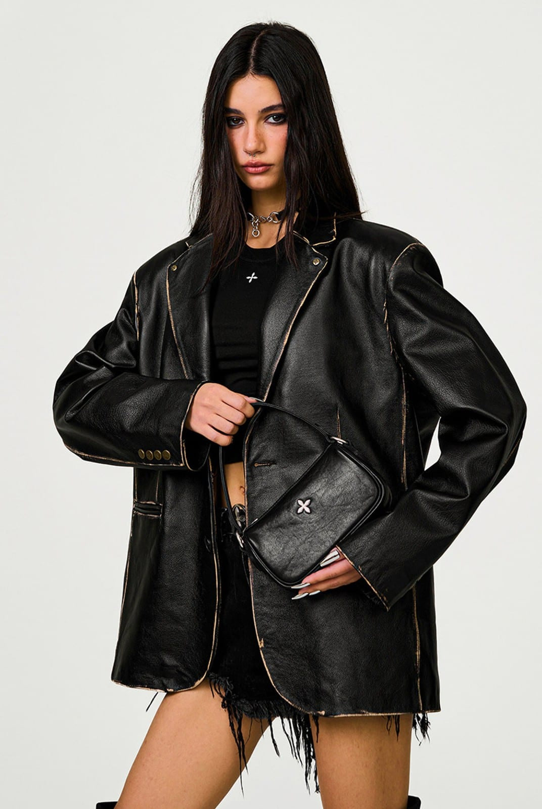 SMFK Cross Badge Leather Shoulder Bag in Black - On Female Model