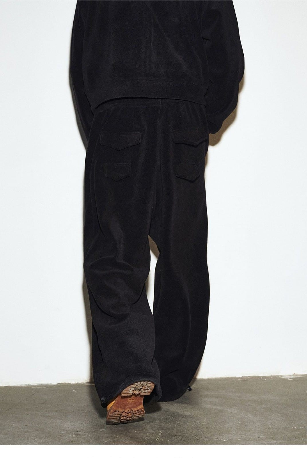 MEDM Lightweight Fleece Drawstring Sweatpants in Black - On Model