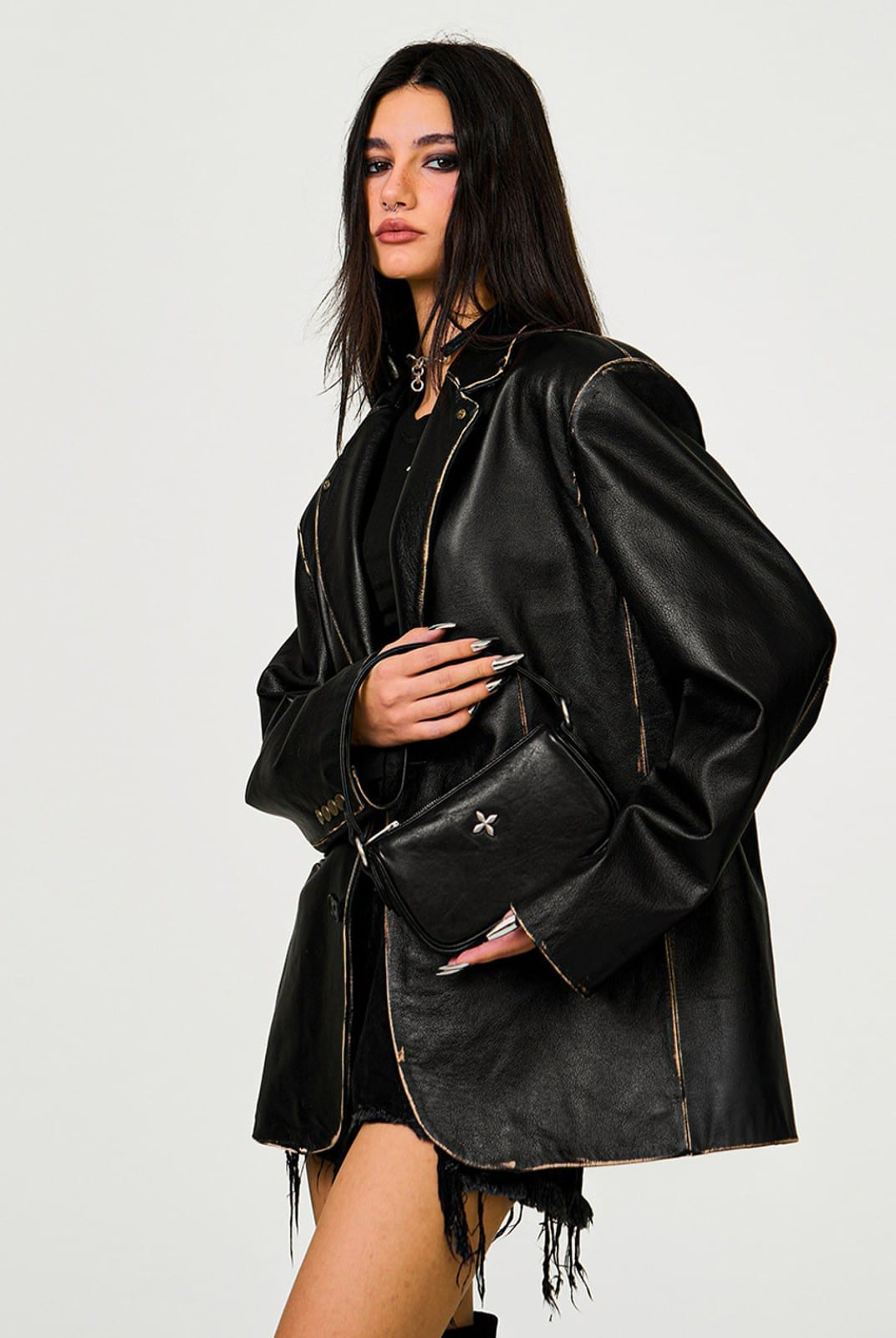SMFK Cross Badge Leather Shoulder Bag in Black - On Female Model
