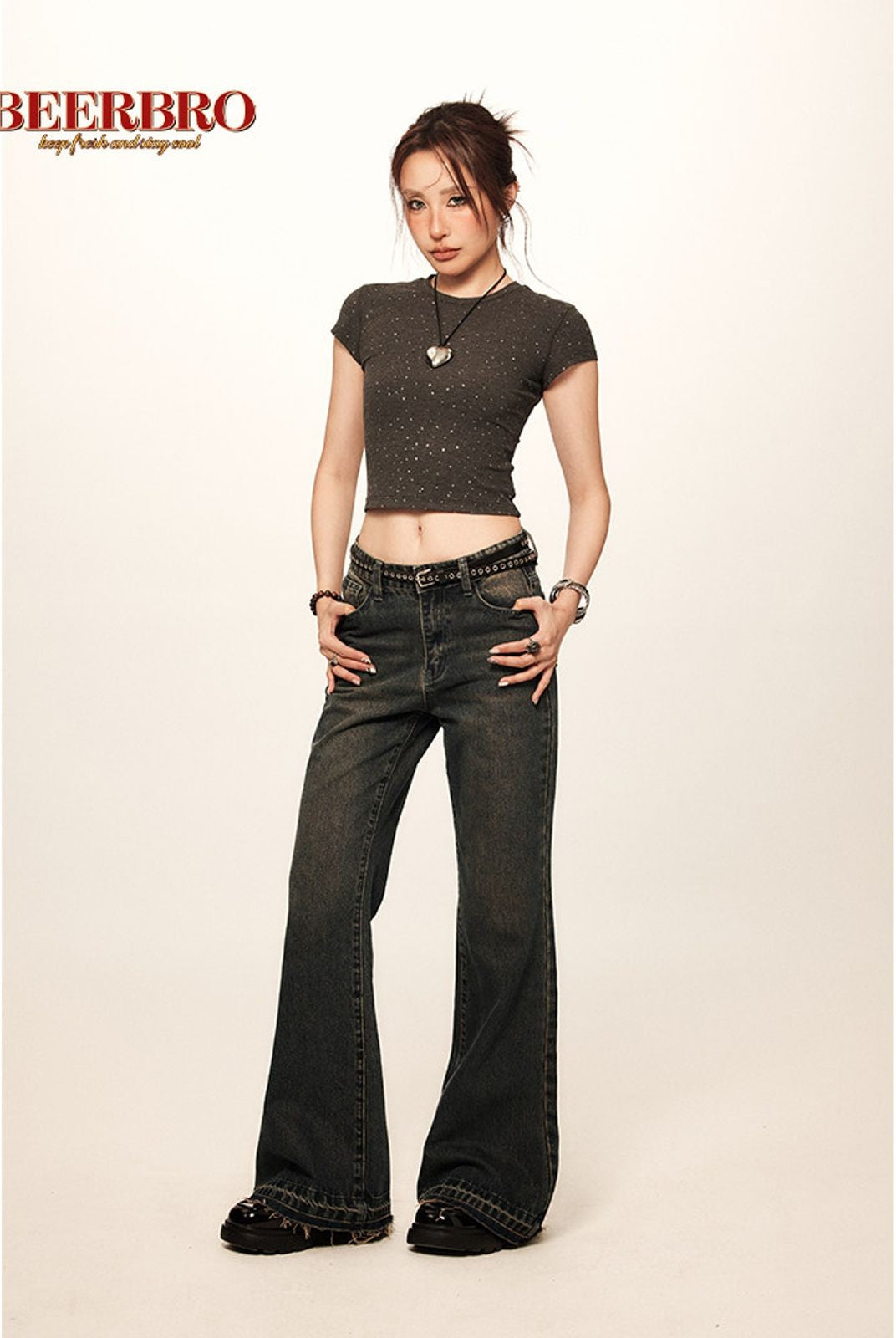 BeerBro Low Rise Raw Hem Micro Flare Jeans in Navy Blue - On Female Model