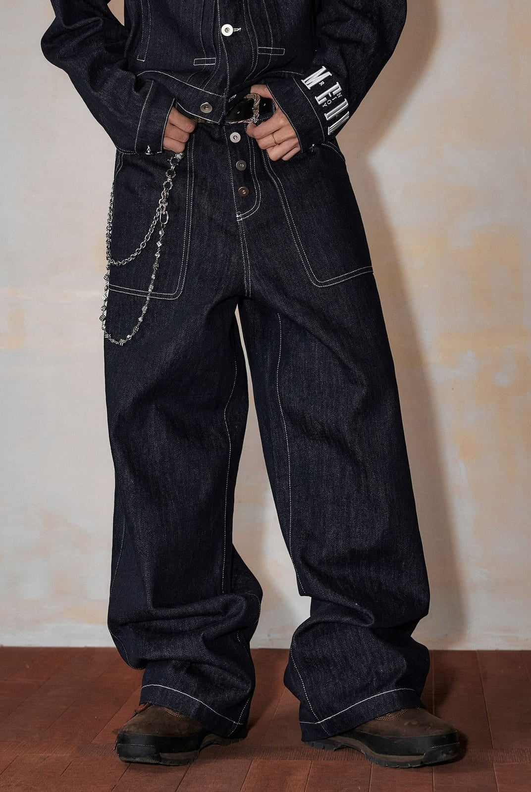 MEDM Contrast Stitch Raw Denim Jeans in Blue - On Model