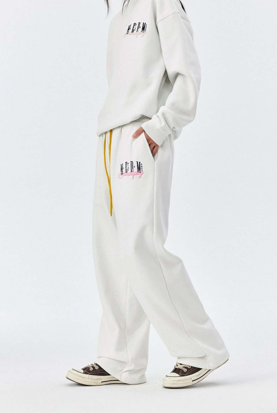 MEDM Fleece Lined Embroidered Sweatpants in White - On Female Model