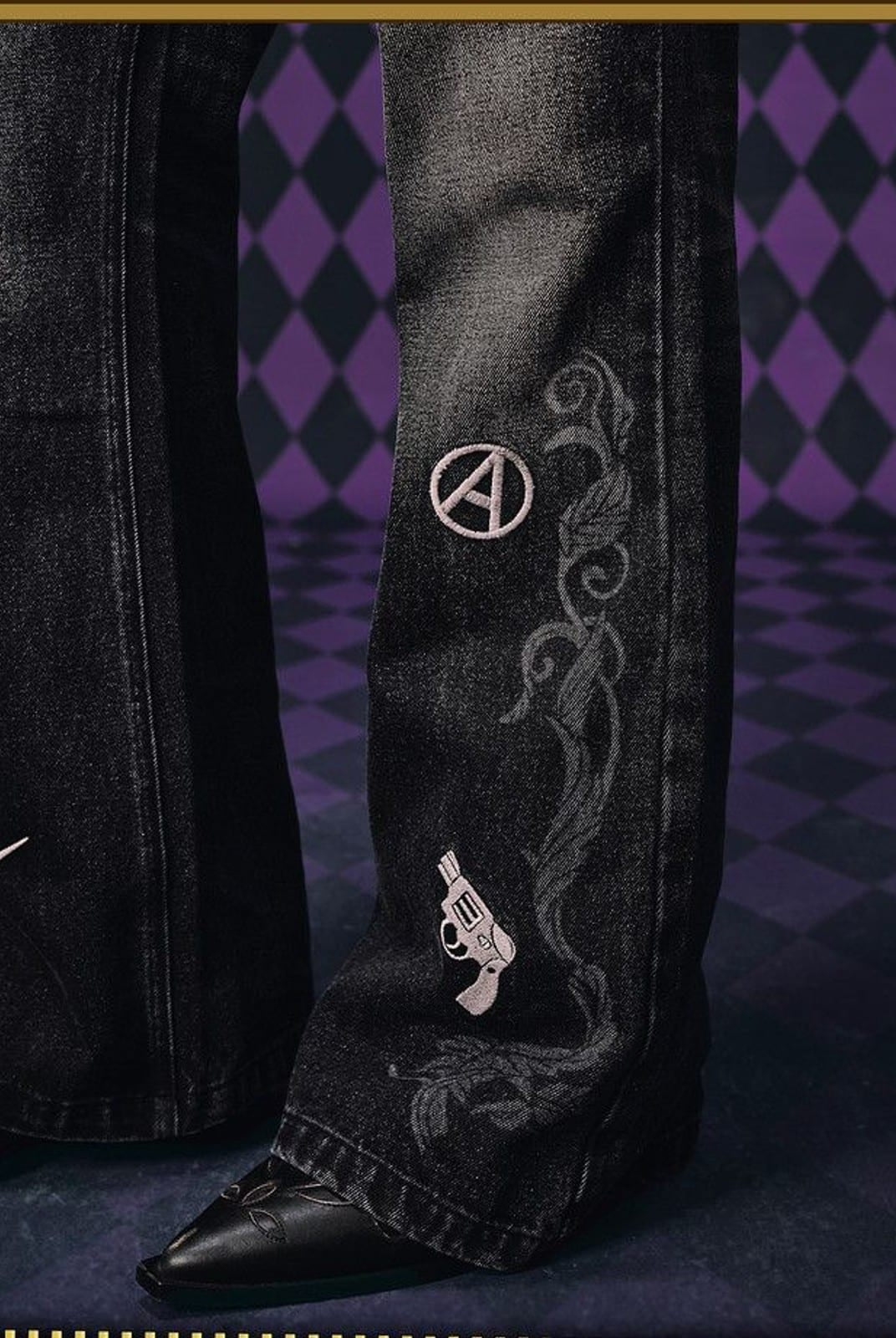 MEDM Icon Embroidered Distressed Jeans in Black - On Model