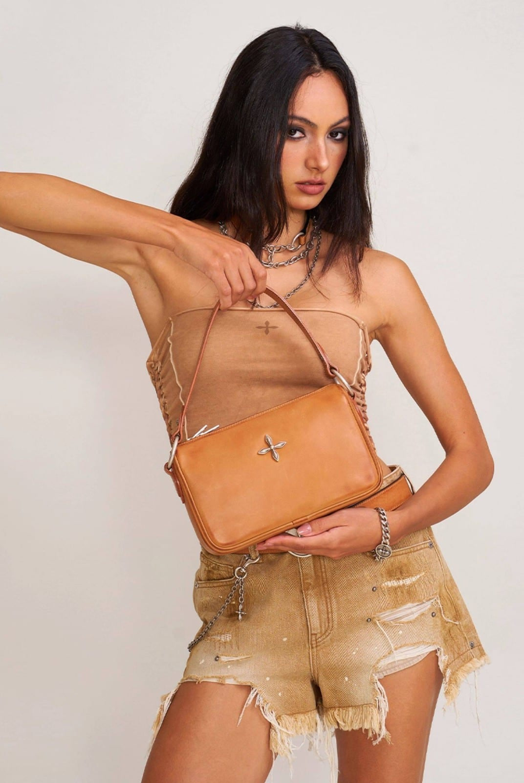 SMFK Cross Emblem Burnished Leather Shoulder Bag in Brown - On Female Model