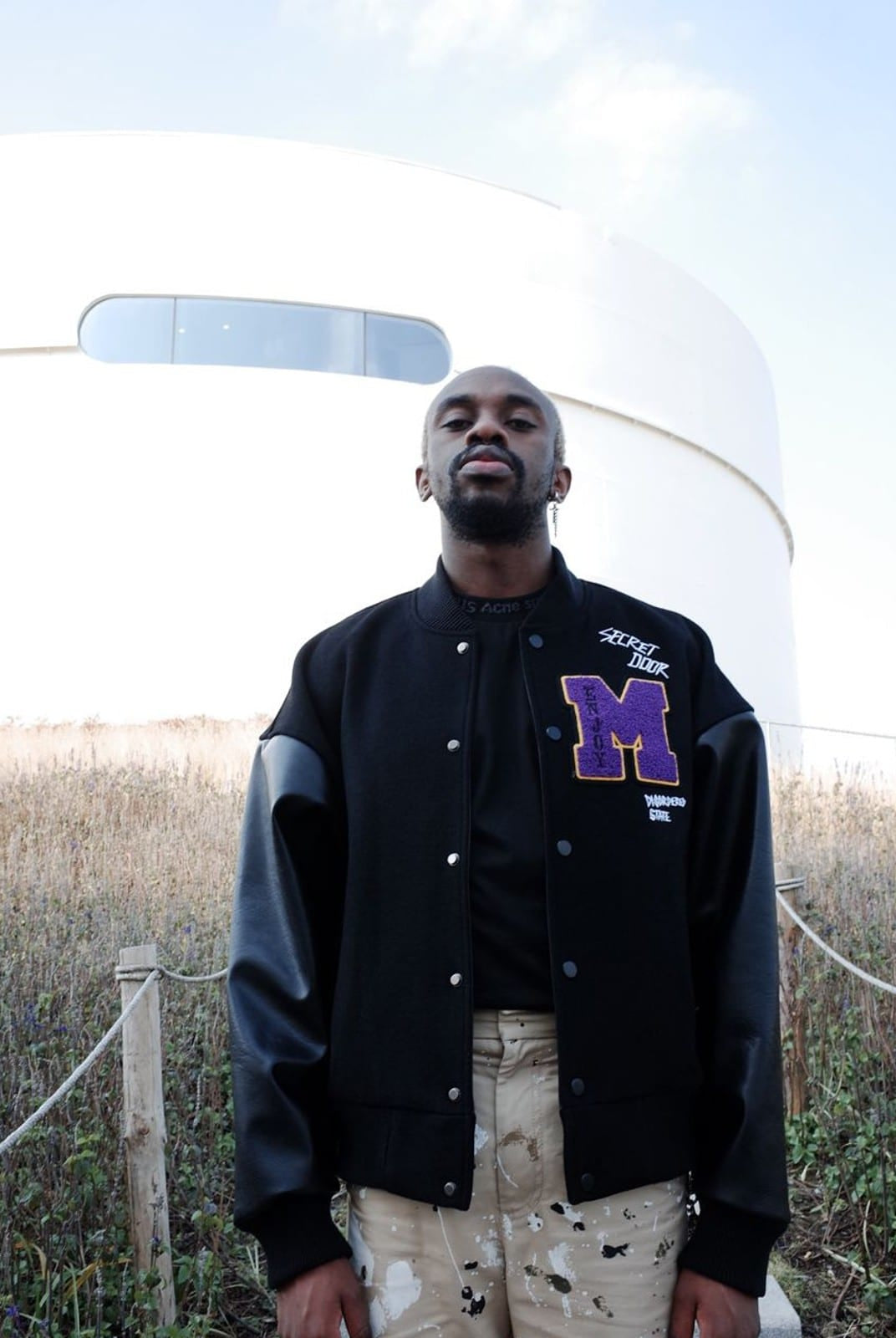 MEDM Wool Blend Varsity Jacket in Black - On Male Model