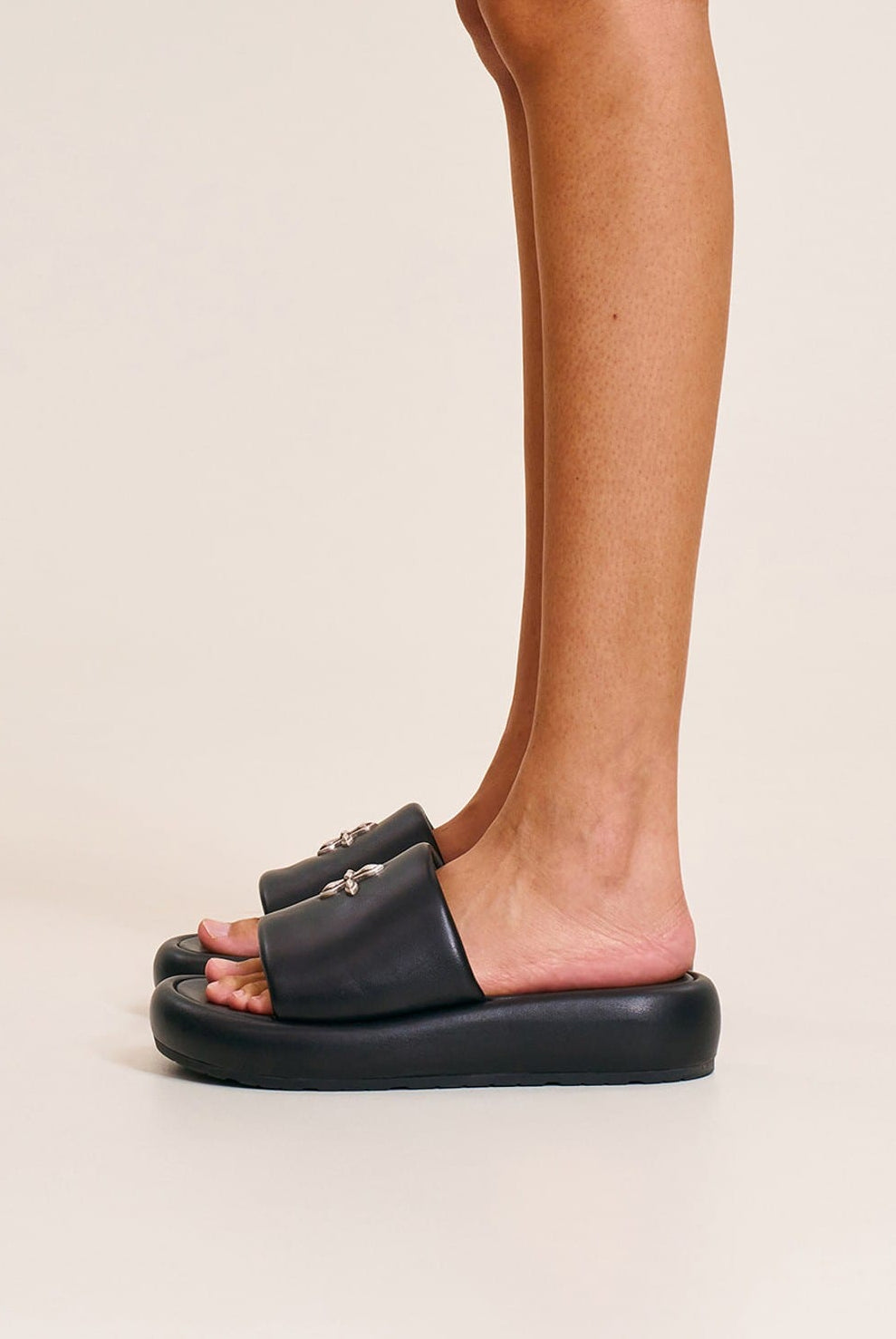 SMFK Cowhide Leather Cross Hardware Slides in Black - On Model