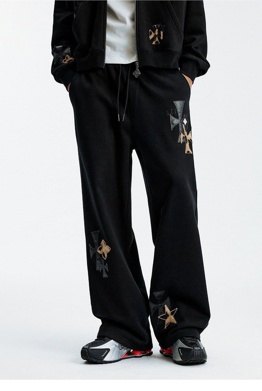 MEDM Leopard Leather Patch Drawstring Pants in Black - On Model