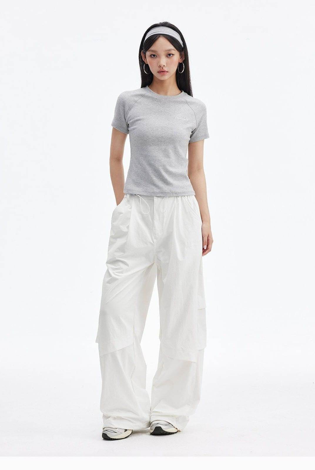 MEDM Crinkled Nylon Parachute Cargo Pants in White - On Female Model