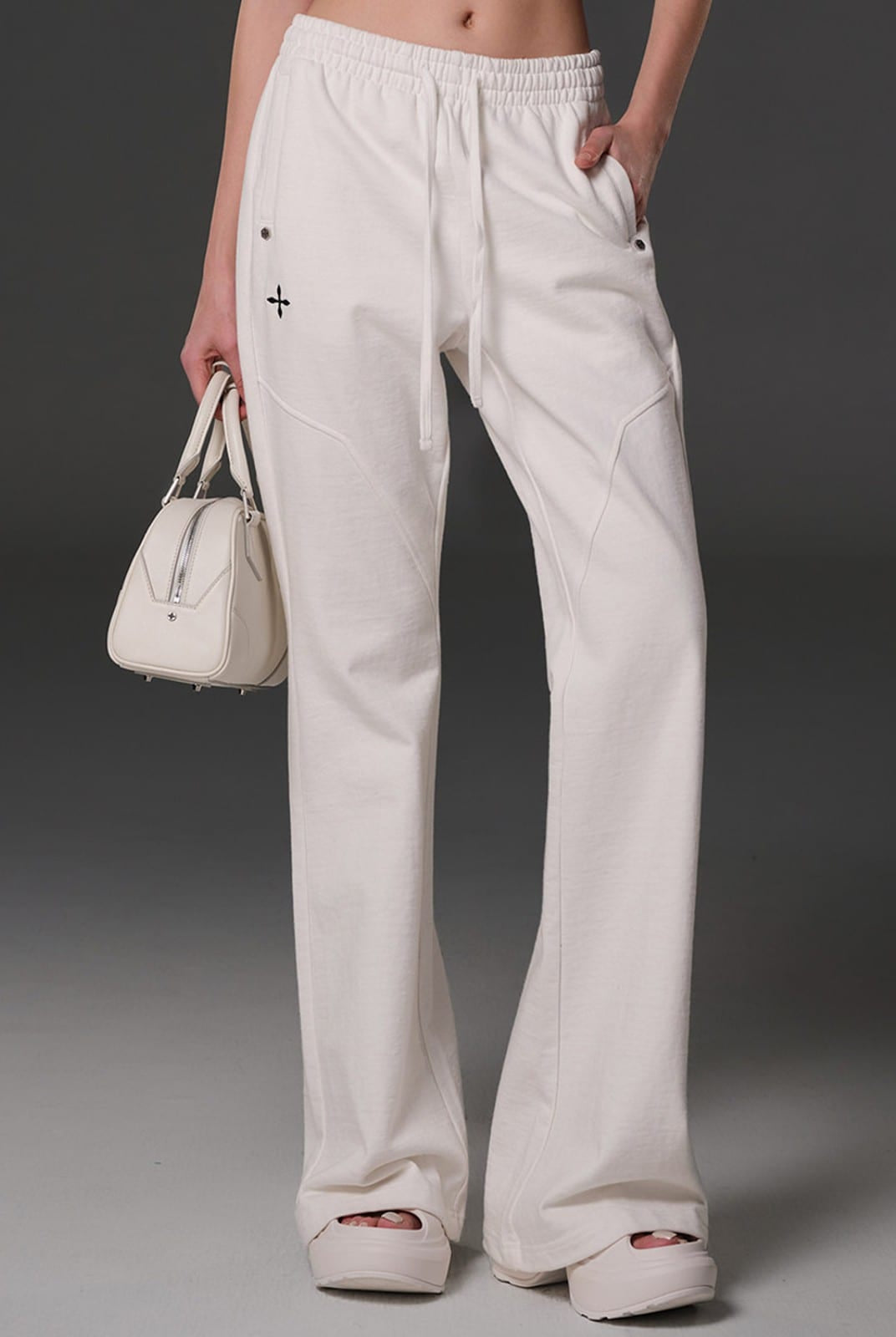 SMFK Cotton Blend Flared Sweatpants in White - On Female Model