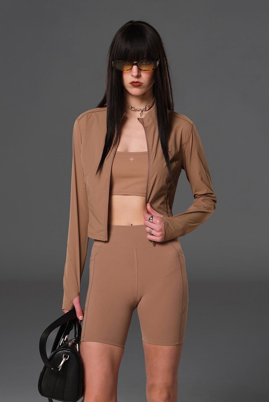 SMFK Cropped Stretch Nylon Track Jacket in Brown - On Female Model