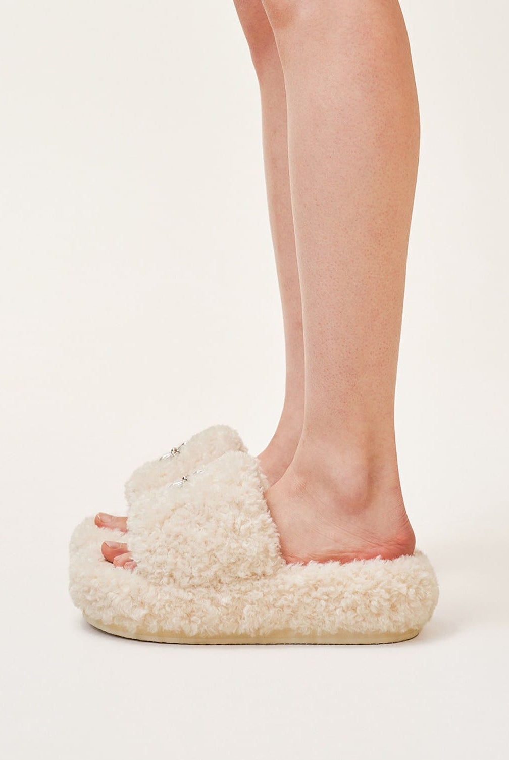 SMFK Cross Motif Faux Fur Platform Slides in White - On Model