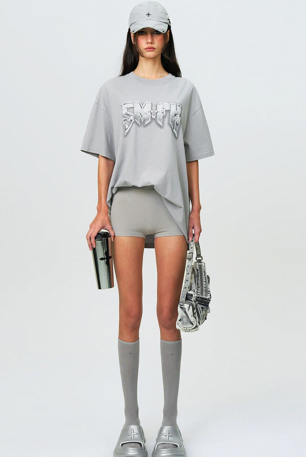 SMFK Metallic Logo Cotton T Shirt in Gray - On Female Model