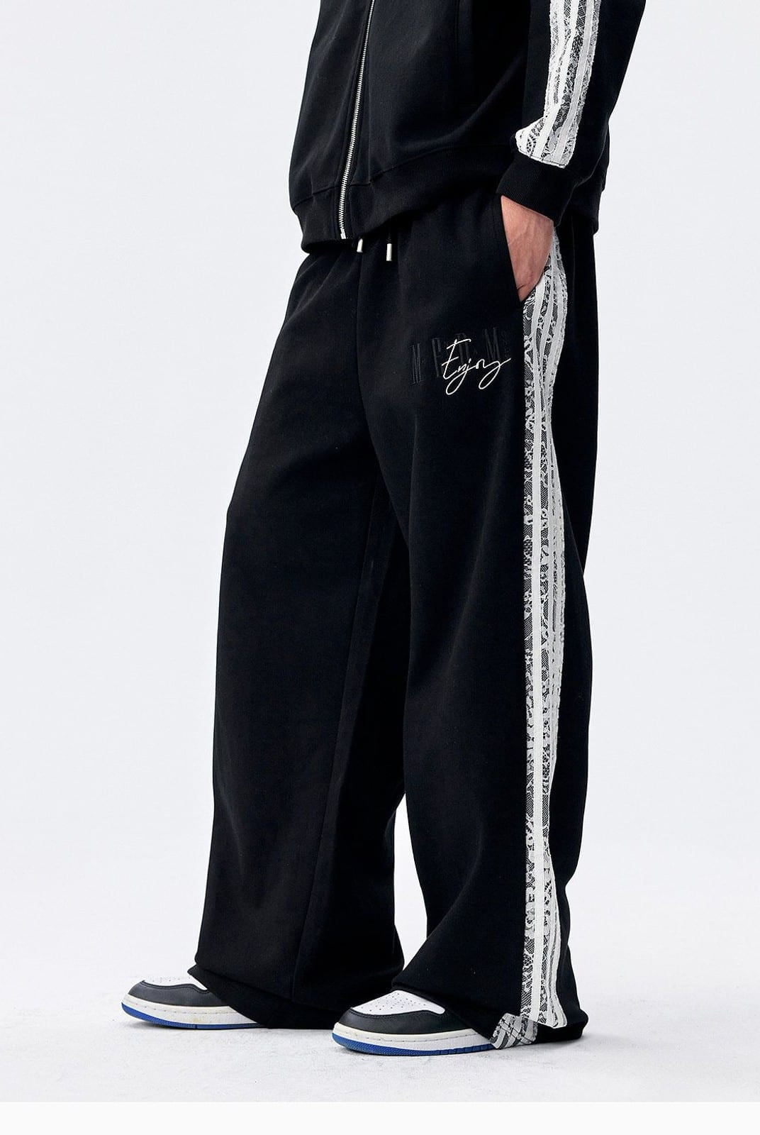MEDM Lace Paneled Striped Track Pants in Black - On Model