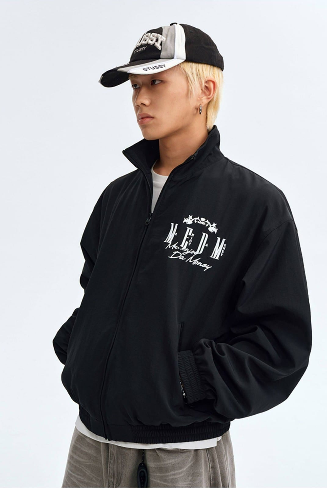 MEDM Nylon Stand Collar Coach Jacket in Black - On Male Model