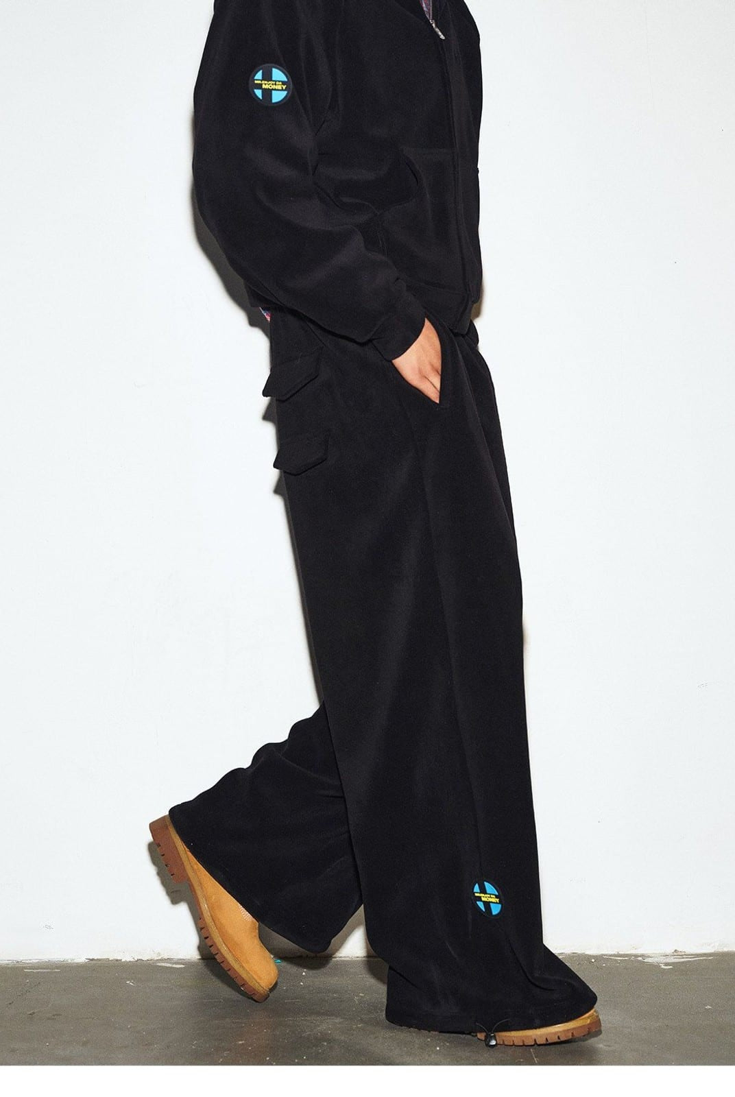 MEDM Lightweight Fleece Drawstring Sweatpants in Black - On Model