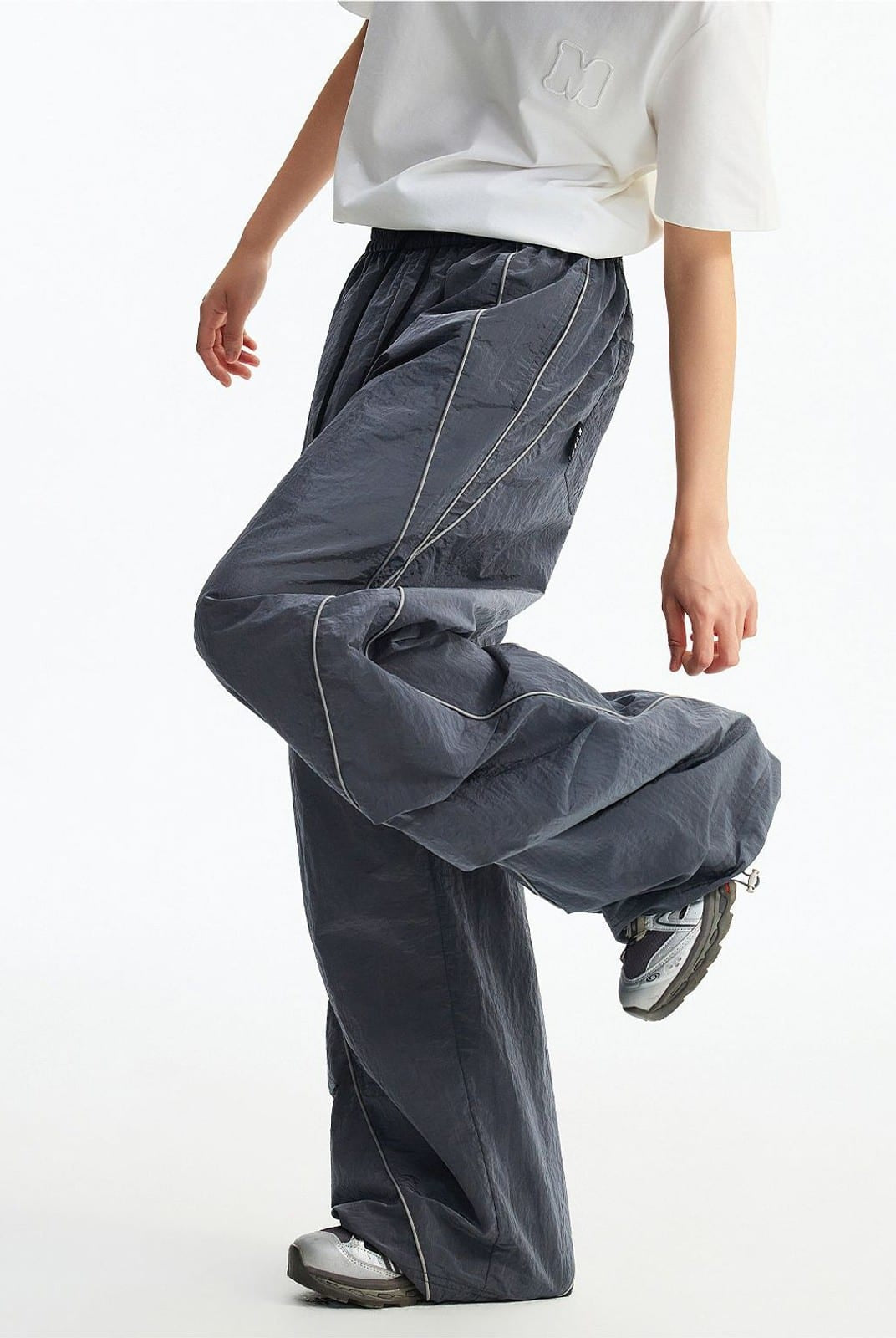 MEDM Glossy Piped Techwear Track Pants in Gray - On Model