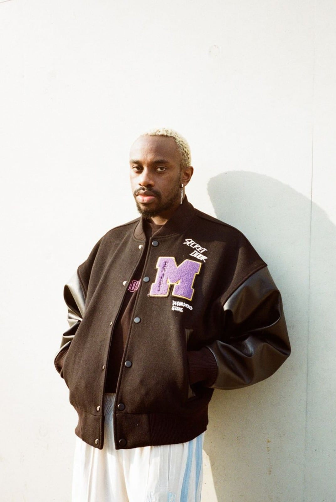 MEDM Wool Blend Varsity Jacket in Black - On Male Model