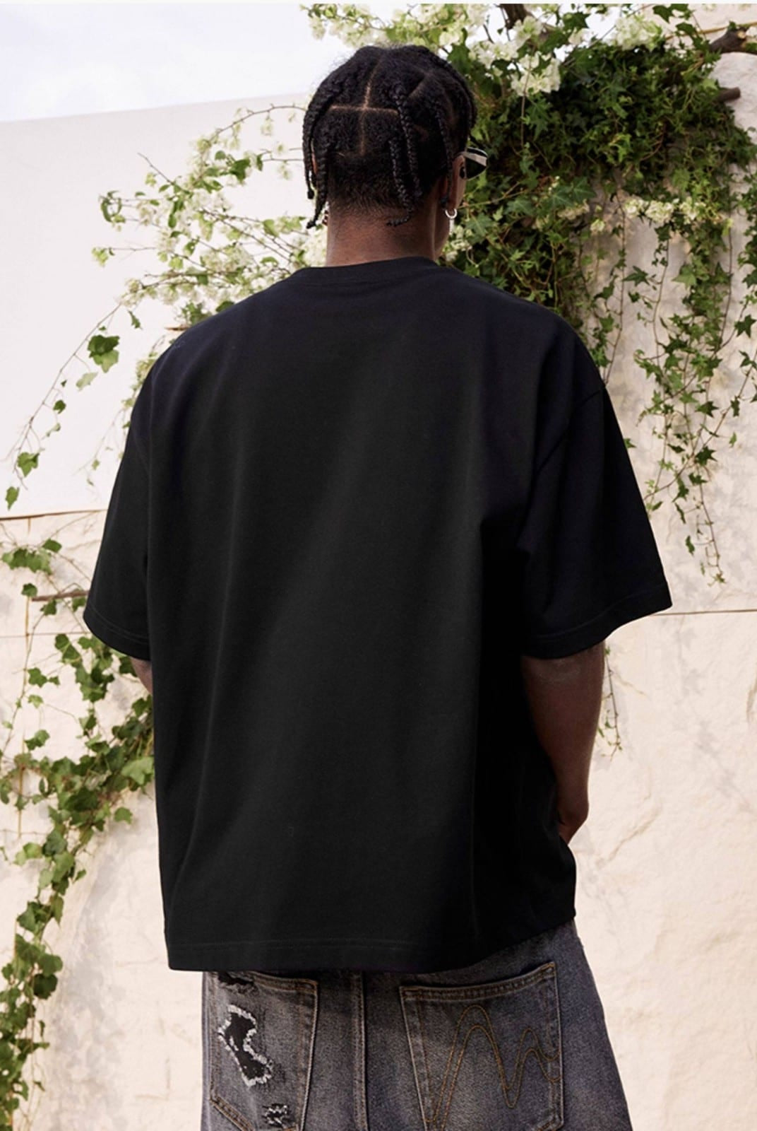 MEDM Tufted Logo Cotton T Shirt in Black - On Model