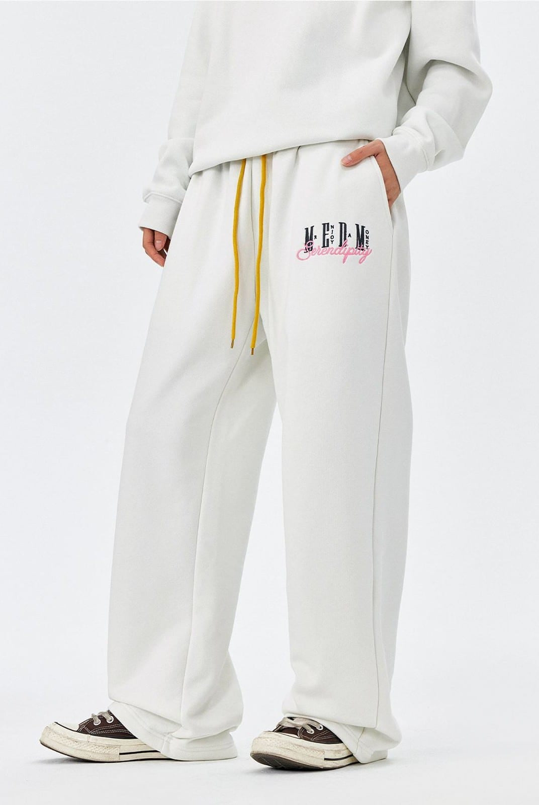 MEDM Fleece Lined Embroidered Sweatpants in White - On Model