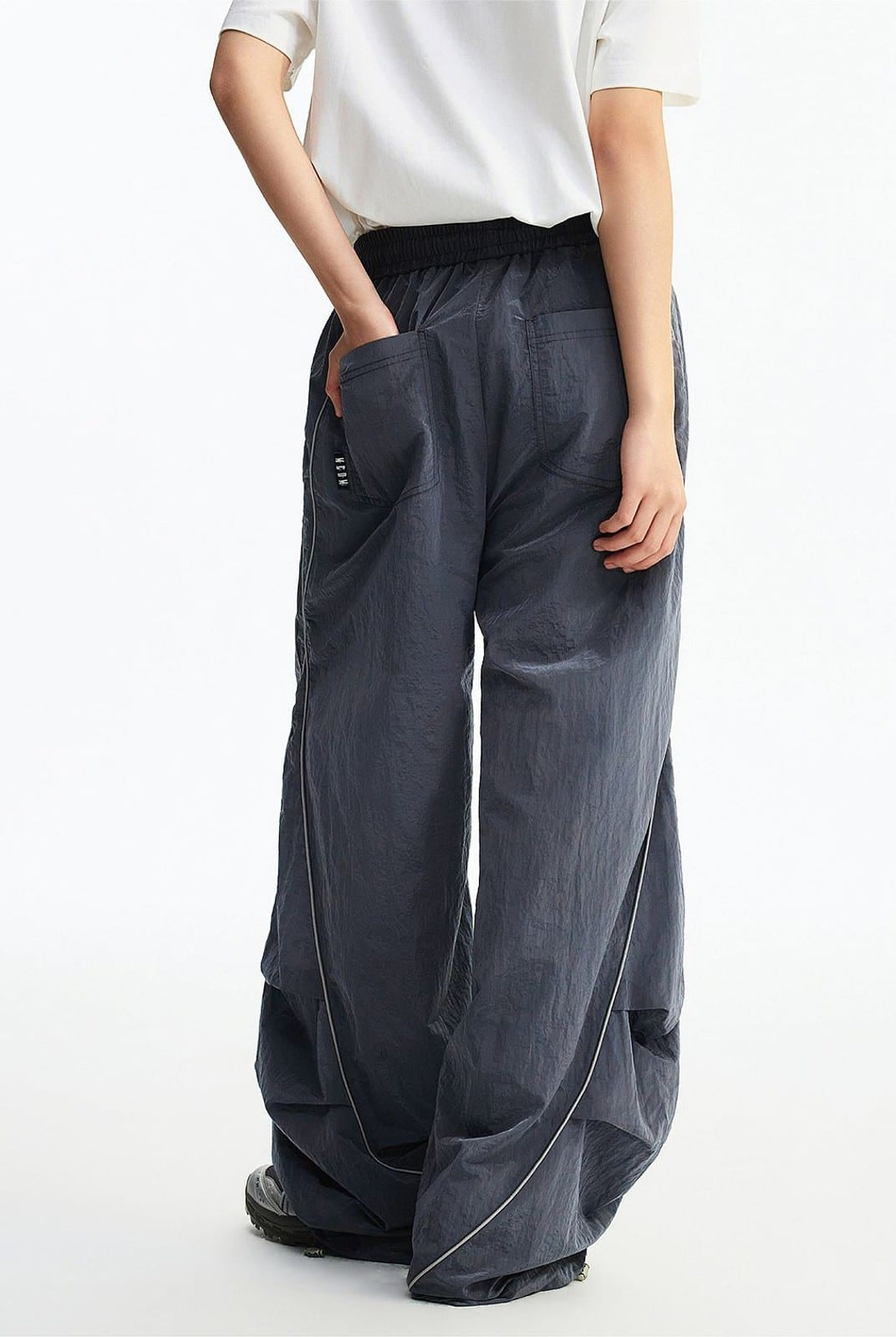 MEDM Glossy Piped Techwear Track Pants in Gray - On Model