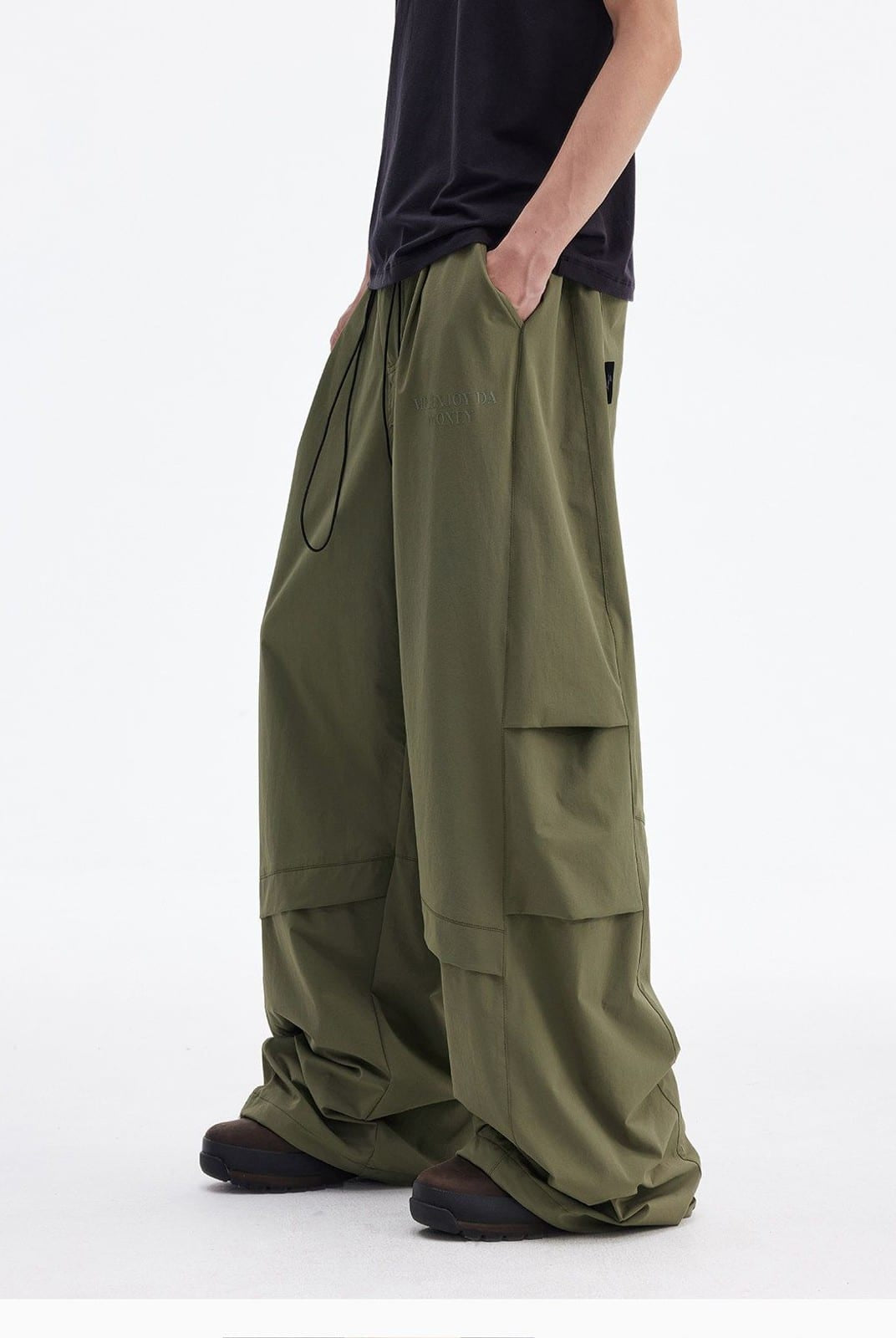 MEDM Crinkled Nylon Parachute Cargo Pants in Olive - On Male Model