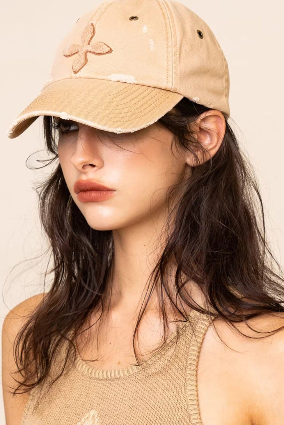 SMFK Distressed Cross Embroidered Baseball Cap in Beige - On Female Model