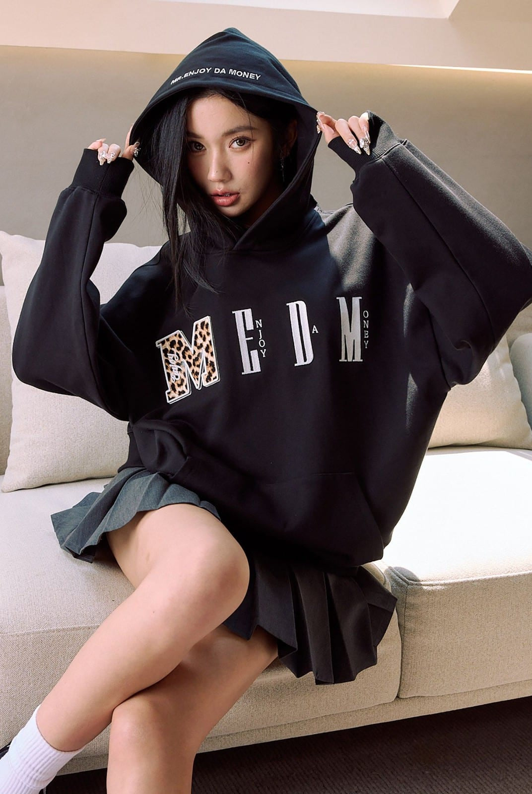 MEDM Animal Print Logo Pullover Hoodie in Black - On Female Model