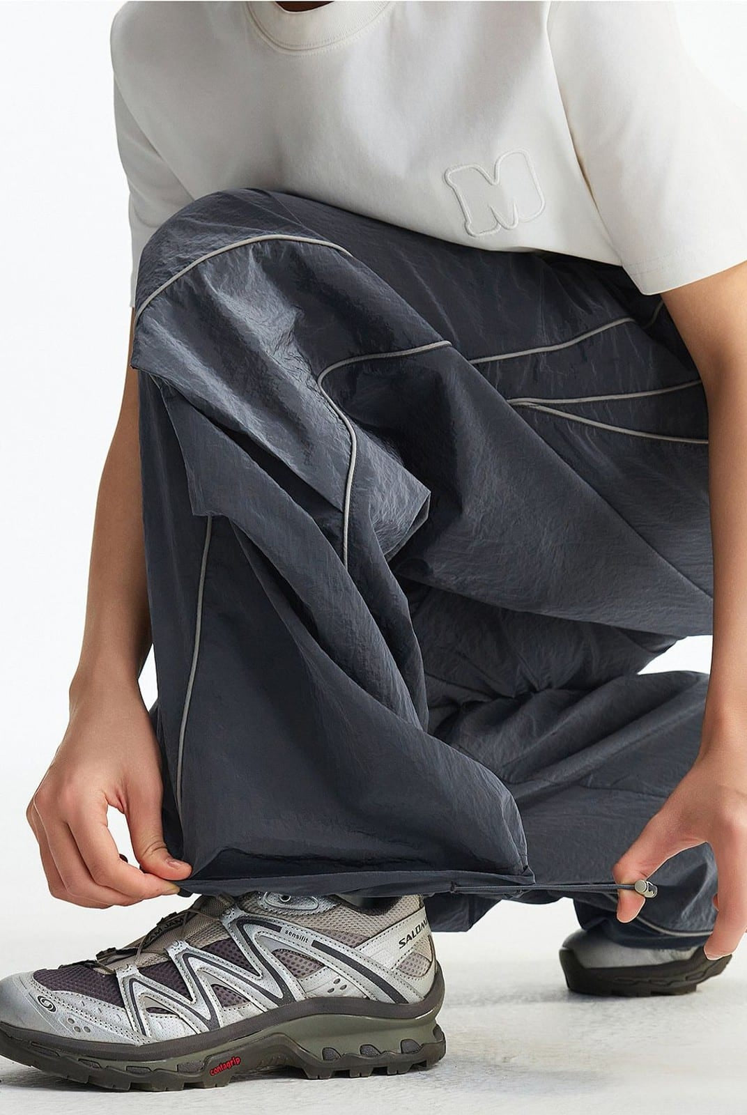 MEDM Glossy Piped Techwear Track Pants in Gray - On Model
