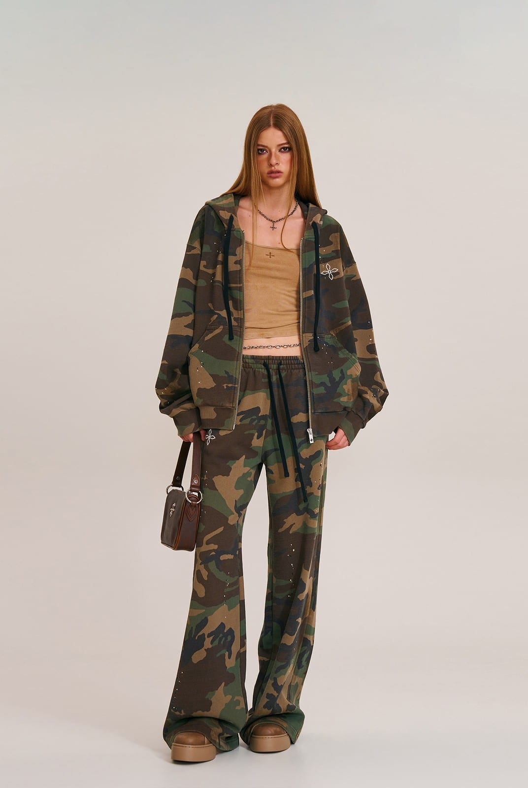 SMFK Cross Embroidered Zip Up Hoodie in Olive - On Female Model