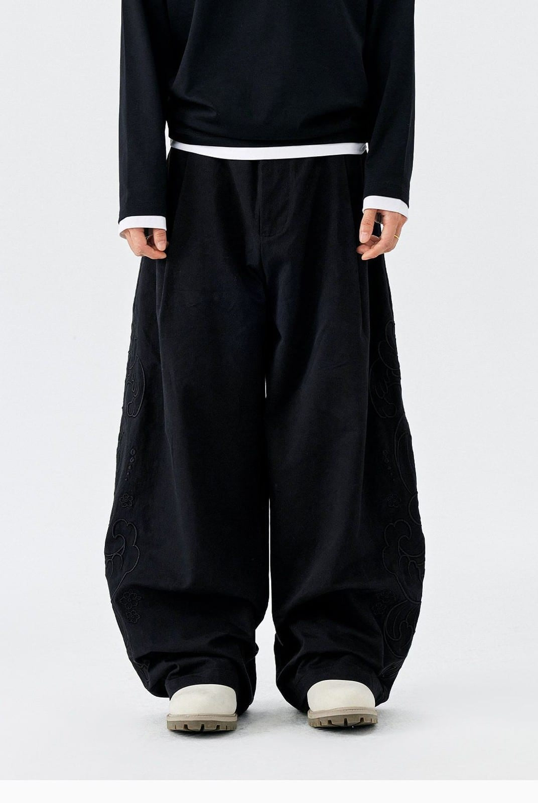 MEDM Embroidered Cotton Cargo Pants in Black - On Model