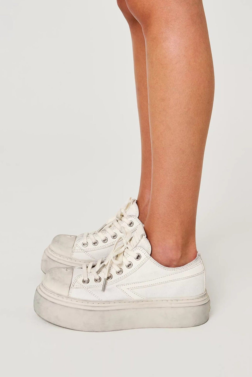 SMFK Distressed Canvas Skate Sneakers in White - On Female Model