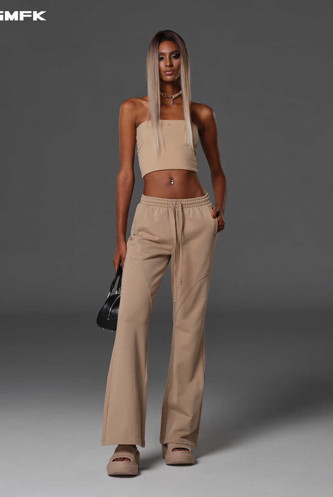 SMFK Cotton Blend Flared Sweatpants in Beige - On Female Model