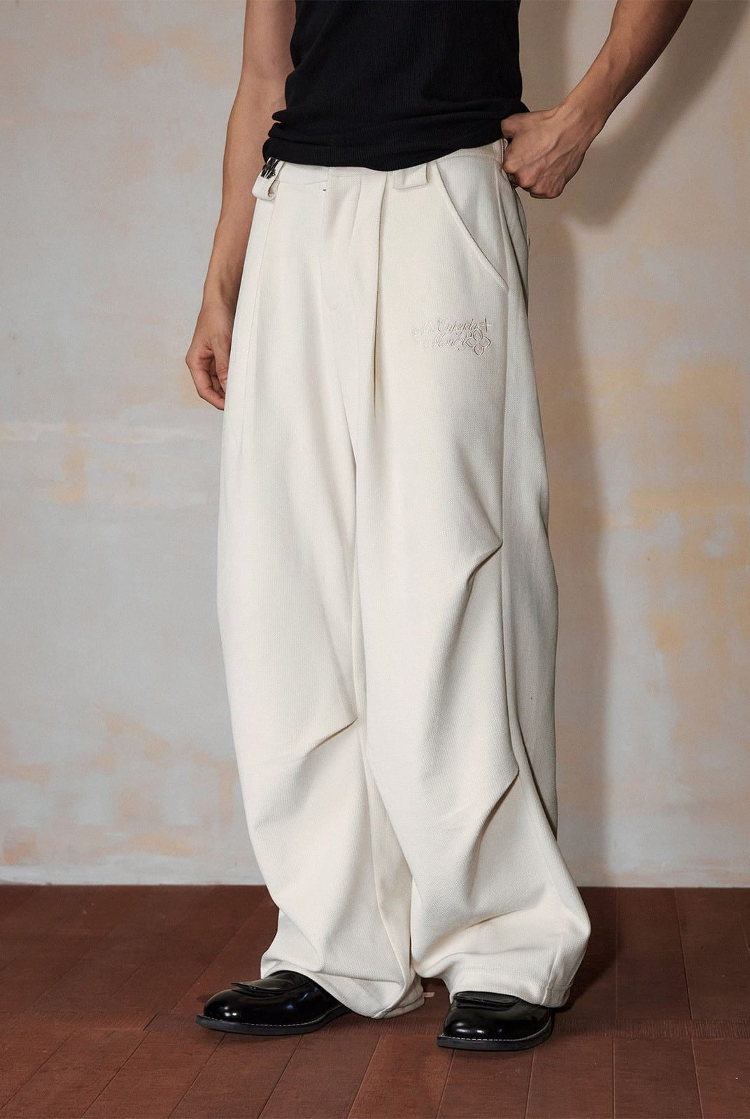 MEDM Wide Leg Parachute Cargo Pants in White - On Male Model