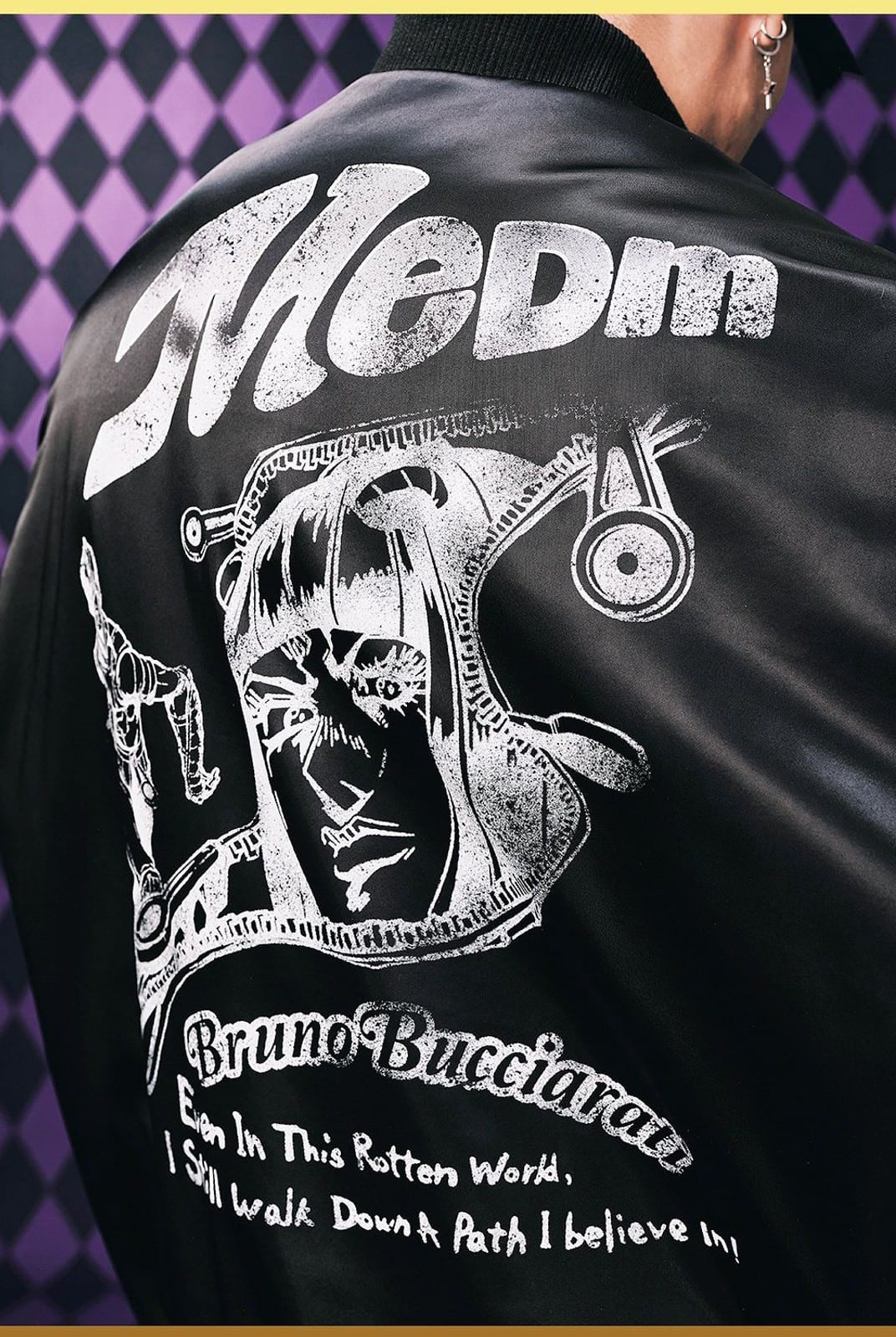 MEDM JoJo Collab Graphic Puffer Bomber in Black - On Model