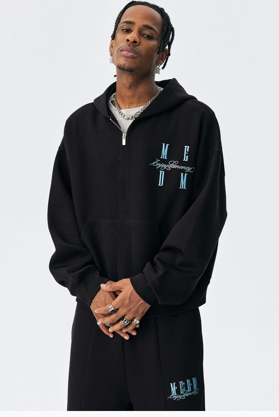 MEDM Embroidered Cotton Blend Zip Up Hoodie in Black - On Male Model