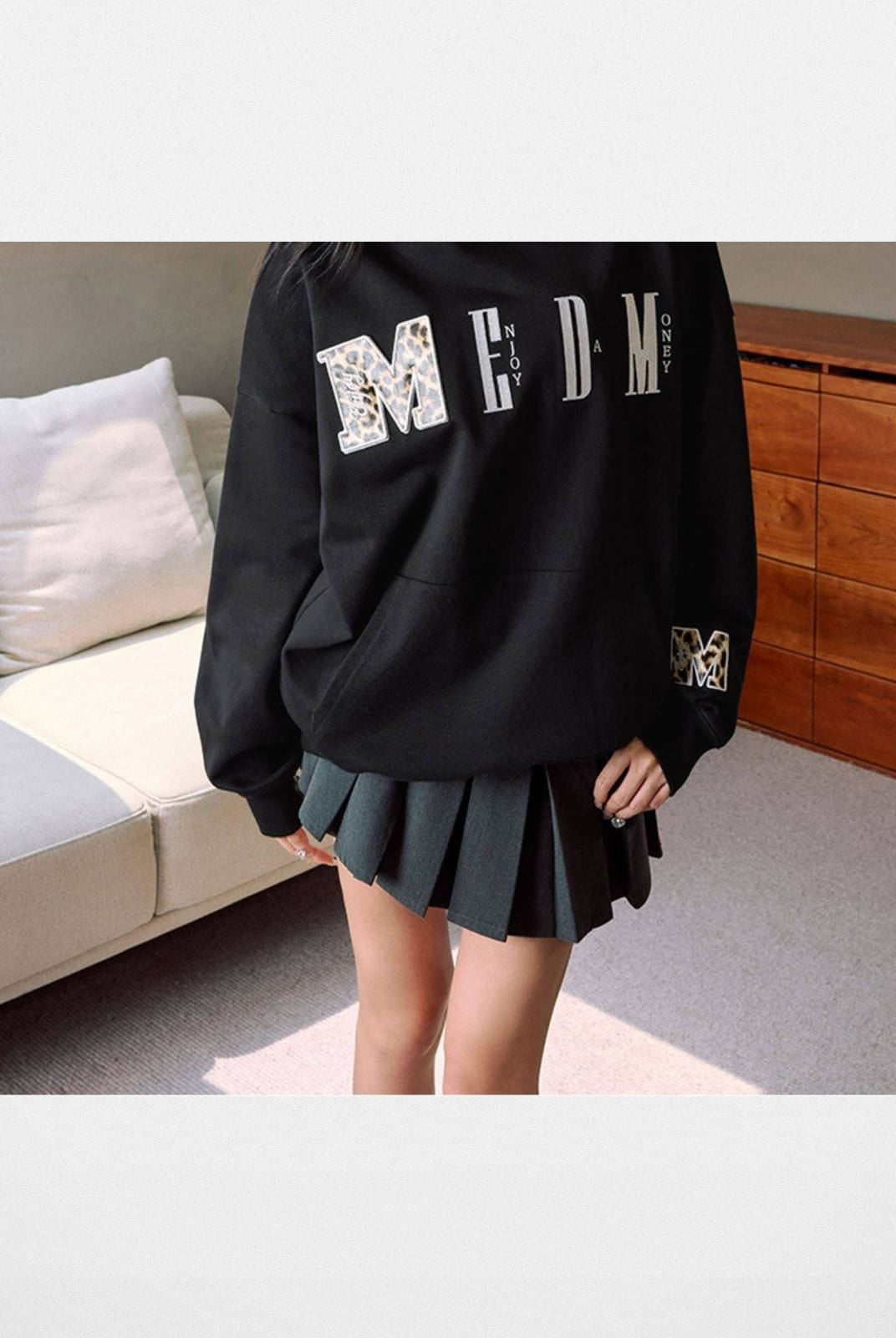 MEDM Animal Print Logo Pullover Hoodie in Black - On Female Model