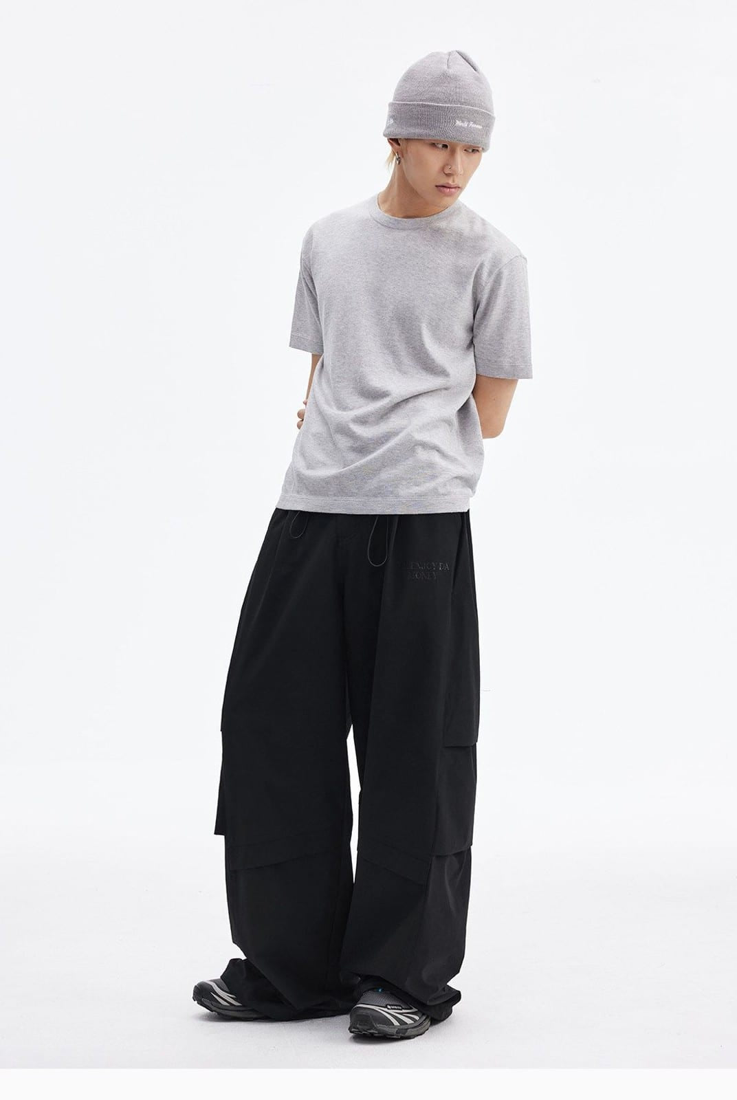MEDM Crinkled Nylon Parachute Cargo Pants in Black - On Male Model