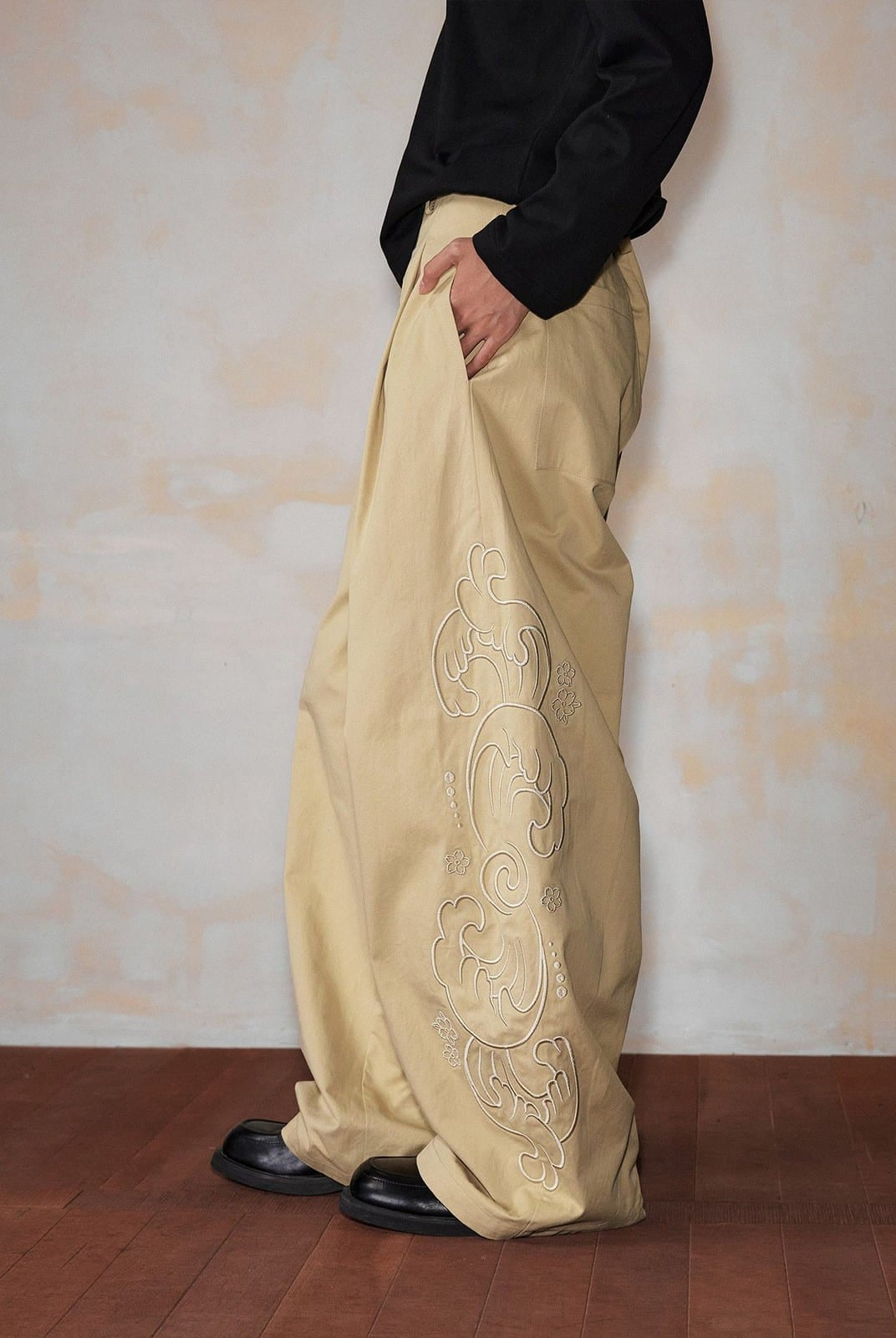 MEDM Embroidered Cotton Cargo Pants in Beige - On Model