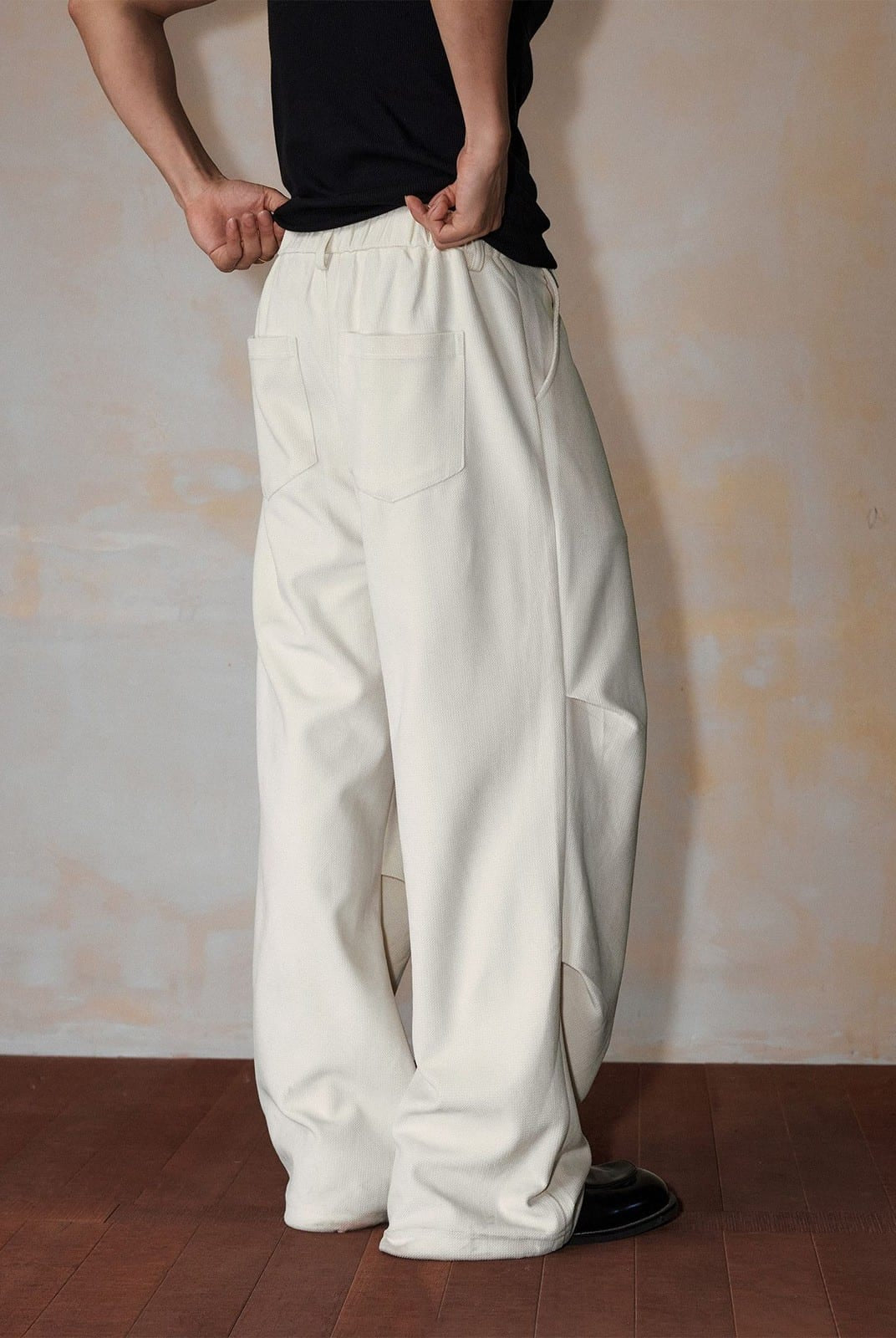 MEDM Wide Leg Parachute Cargo Pants in White - On Model