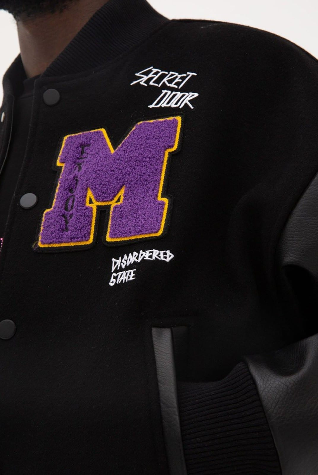 MEDM Wool Blend Varsity Jacket in Black - On Male Model